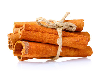cinnamon sticks isolated on white