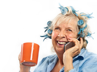 Laughing Lady on Cell Phone with Coffee Cup