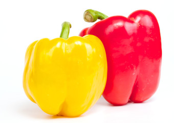 Red and yellow pepper are isolated on a white background