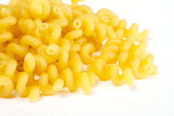 dried italian pasta on white background