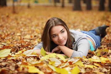 beauty girl in autumn park