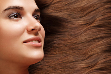 close-up beautiful female face with beautiful healthy long hairs