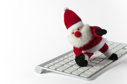 Weihnachtsmann tanzt auf der Tastatur