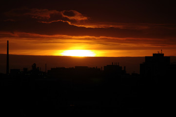 Fototapeta na wymiar City during warm sunset