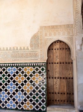 door in the nazari palace of alhambra, granada