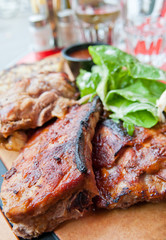 Grilled meat ribs on the plate