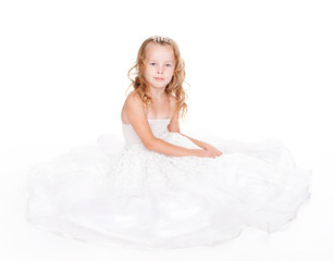 Fototapeta na wymiar pretty little girl in beautiful white dress