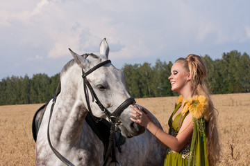 Obraz premium Horse and woman face to face