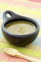 tomatillo sauce in colombian clay dish