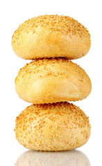 delicious buns with sesame seeds isolated on white