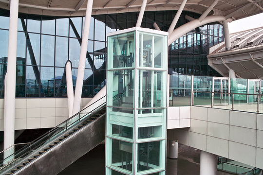 Glass elevator and escalator
