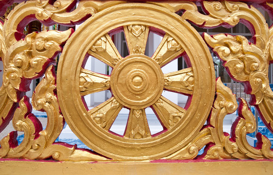 Buddha gear wheel from temple wall.