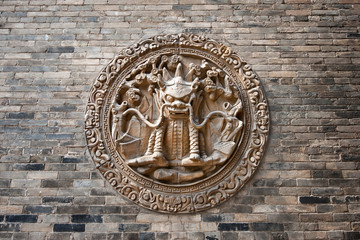 Chinese classic brick wall with animal detail