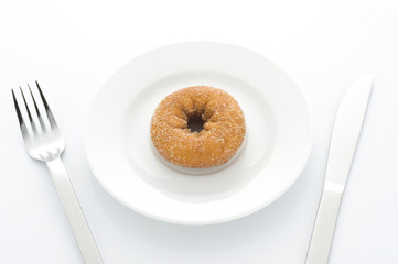 お皿にのせたドーナツ