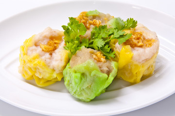 Steamed green and yellow dumplings