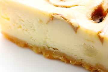 Gourmet slice of cheesecake on the white background