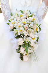 The bride with a wedding bouquet