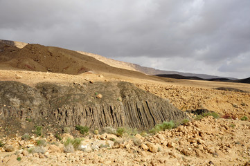 Black hexagonal prism in Negev desert, Israel.