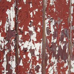 Flaking paint on wood.