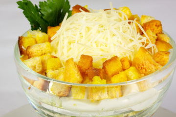 Caesar salad with cheese and croutons