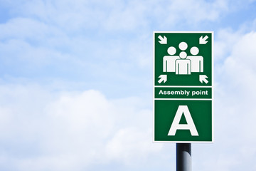 ' Assembly point' sign