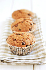 Chocolate muffins in a row