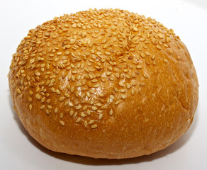 Loaf of bread and rolls isolated on white