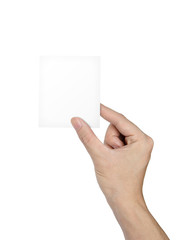 Businessman's hand holding blank paper business card, isolated o