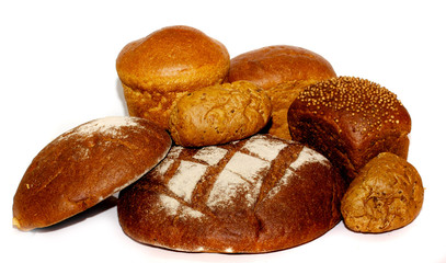loafs of whole wheat and rye bread and isolated