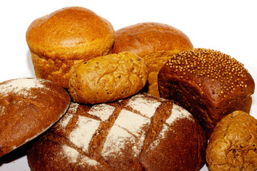 loafs of whole wheat and rye bread and isolated