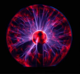 Obraz premium Full plasma ball glowing in the dark