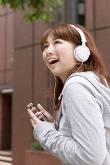 Asian woman in headphone