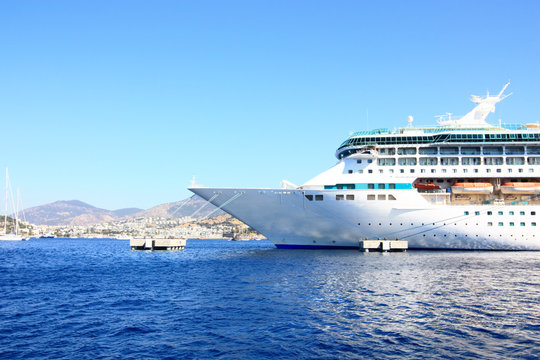 bow of a big cruise ship docked in the mediterranean