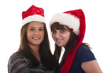Zwei Frauen mit Weihnachtsmannmütze
