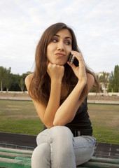 Young woman talking on the phone