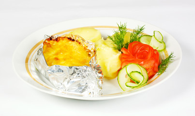 Baked Potato filled with meat and cheese on white plate
