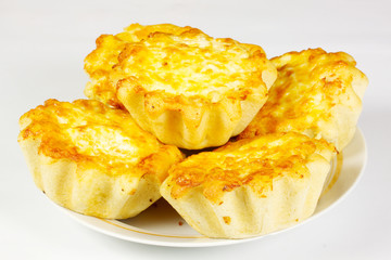 ndividual meat pie with potato topping.
