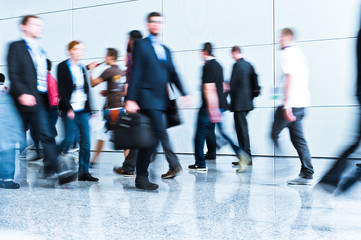 blurred people at a trade fair