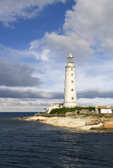 old lighthouse at a coastline