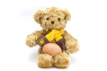 Teddy bear with one egg