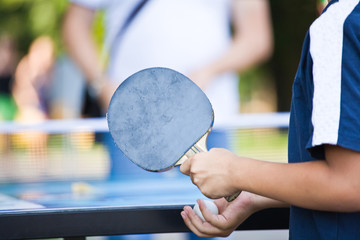 teenager plays Ping-Pong - obrazy, fototapety, plakaty