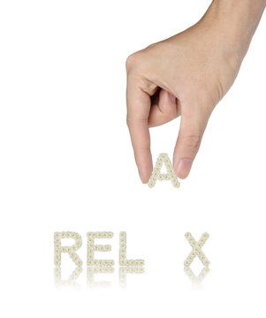Hand and word made from Frangipani flowers relax isolated on whi