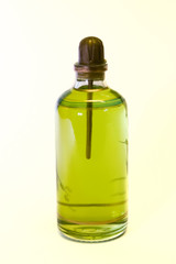 Bottle with green liquid