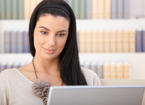 Closeup portrait of woman with laptop