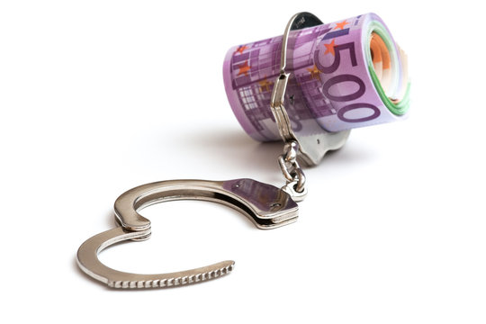 Handschellen und Euro Banknoten