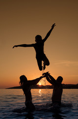Silhouette of boy jumping