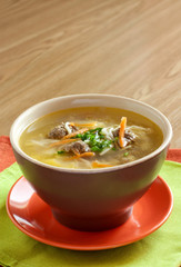 soup with noodles and meatballs