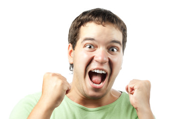 portrait of excited young man shouting from victory isolated