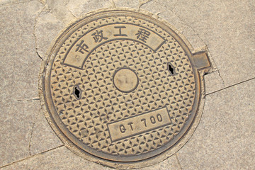 Obraz premium city manhole covers