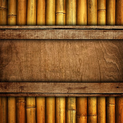 wood board with bamboo - obrazy, fototapety, plakaty